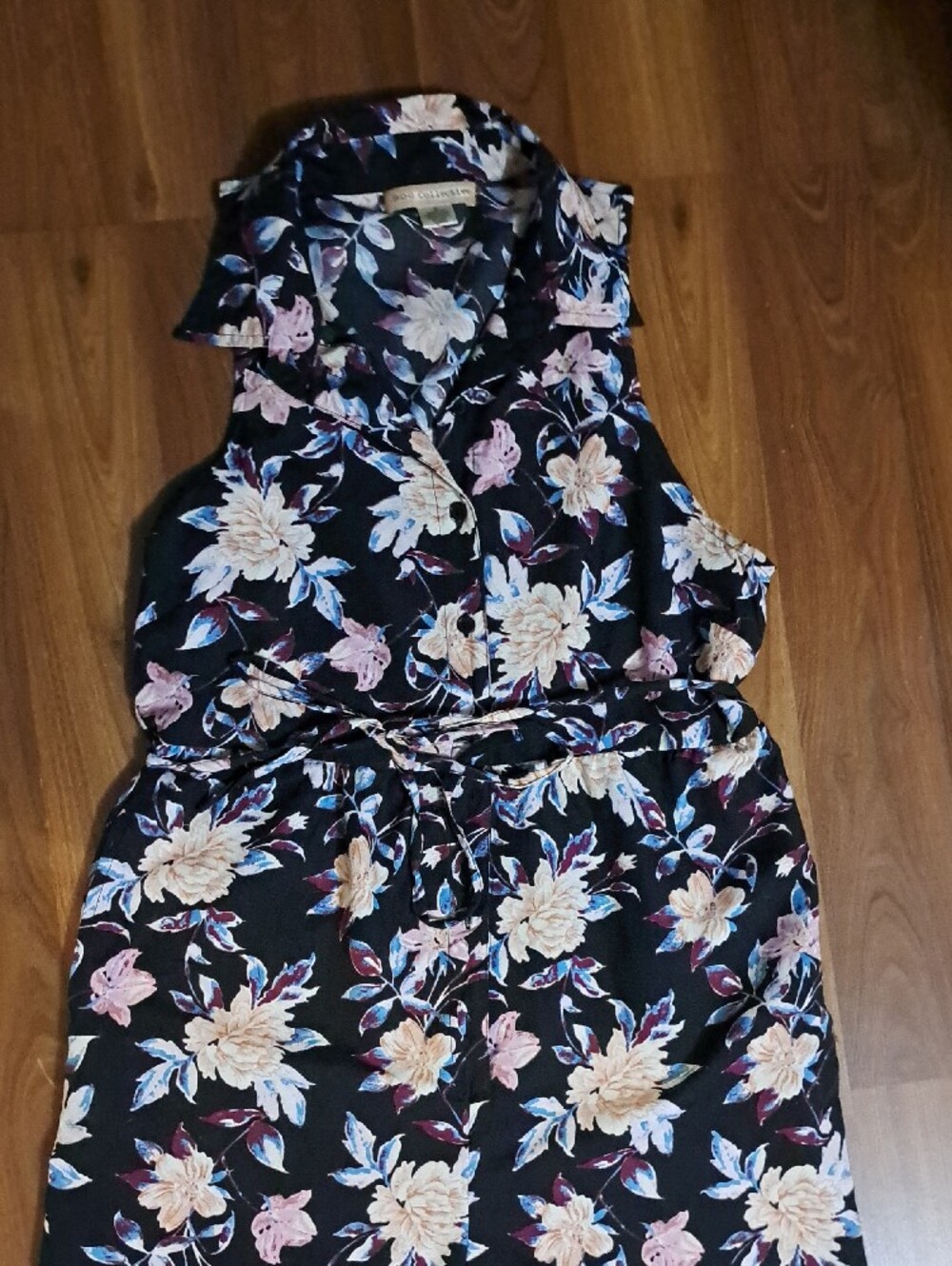 Sleeveless Black Collared Botanical Jumpsuit with Tie Waist. Floral Elegance.